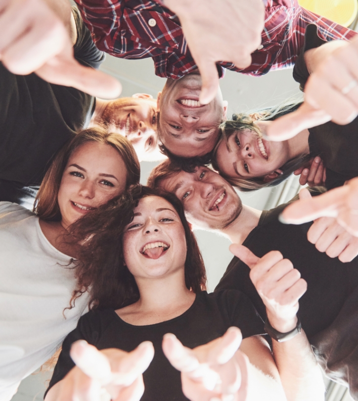 Happy Group Friends With Their Hands Together Middle