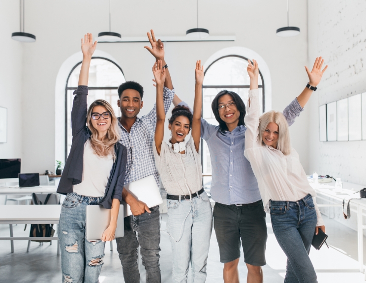 International Tired Students Celebrating End Exams Laughing Lecture Hall Happy Freelance Programmers Done With Long Project Posing With Smile Holding Laptops